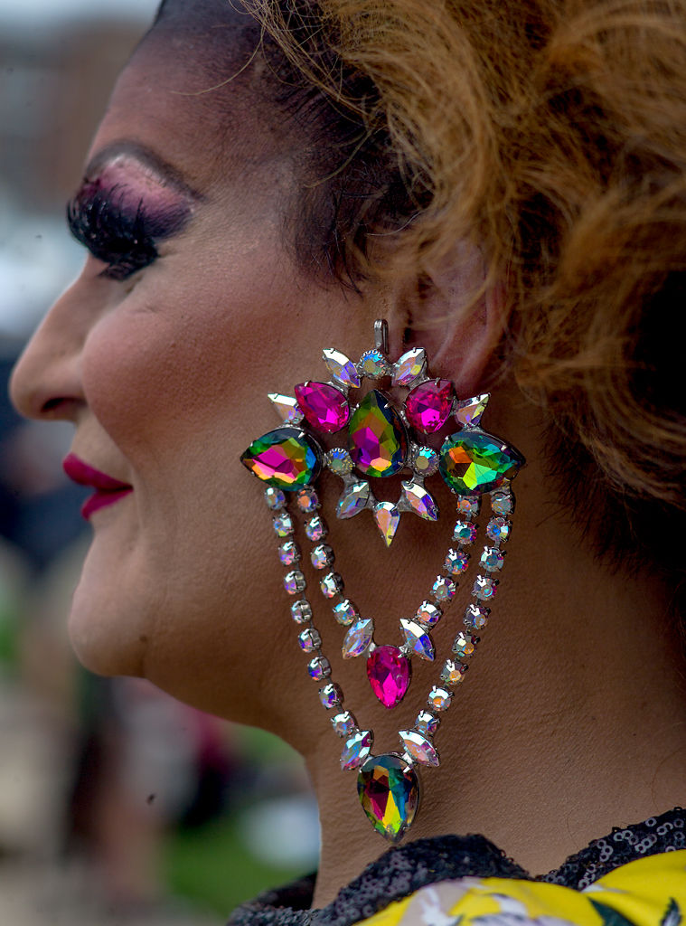 Drag performer Musica Malone speaks with festival attendees
